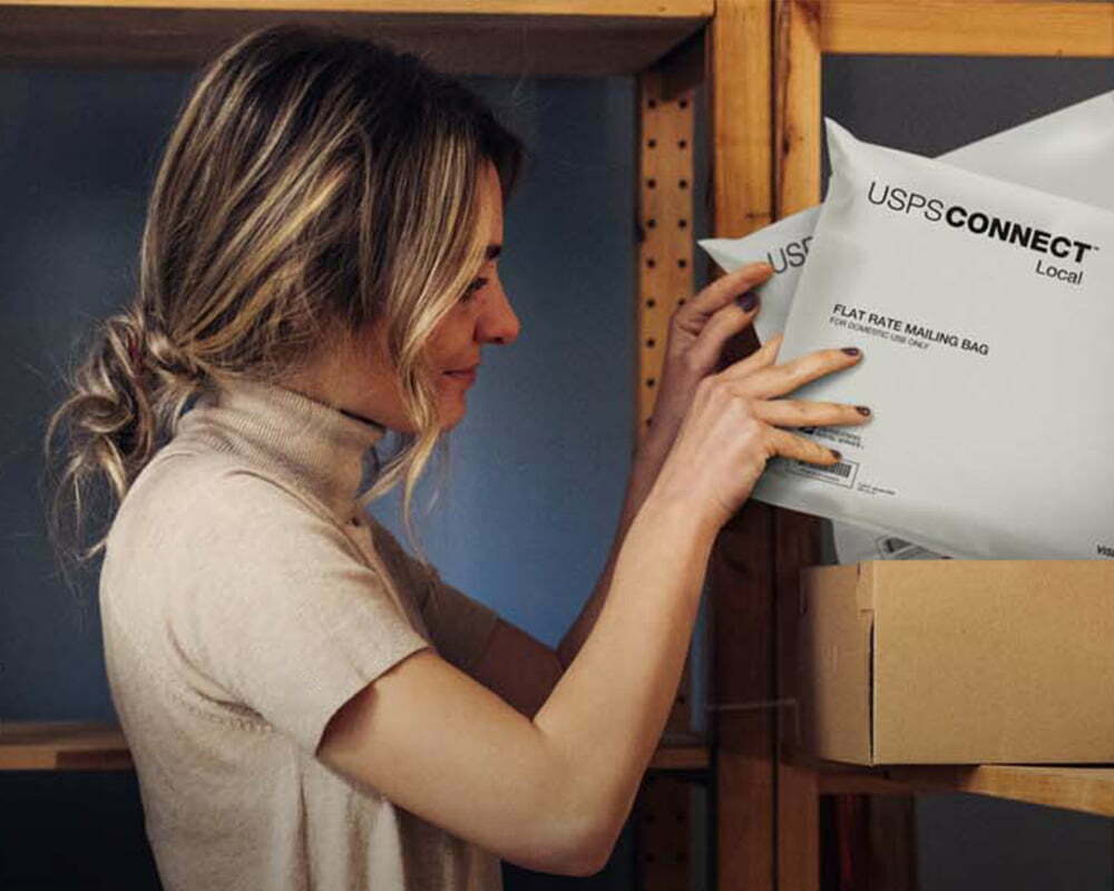 Person with USPS Connect packages Person with USPS Connect packages
